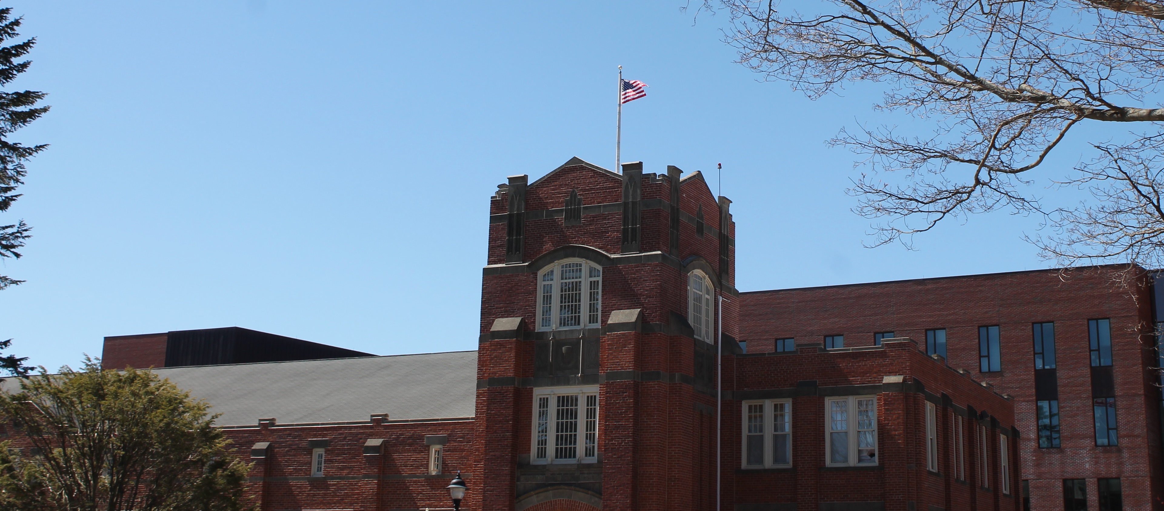 U.S. Flag raised on top of Hawley Armory, the location of UConn's Office of Veterans & Military Programs.